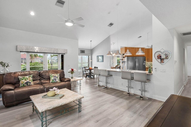 9391 Aqua Vista Blvd, Boynton Beach, FL 33437 - living room with high vaulted ceiling, light wood finished floors, baseboards, a ceiling fan, and recessed lighting