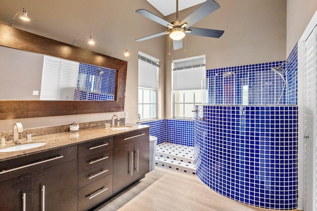9391 Aqua Vista Blvd, Boynton Beach, FL 33437 - full bathroom with walk in shower, ceiling fan, double vanity, and wood finished floors