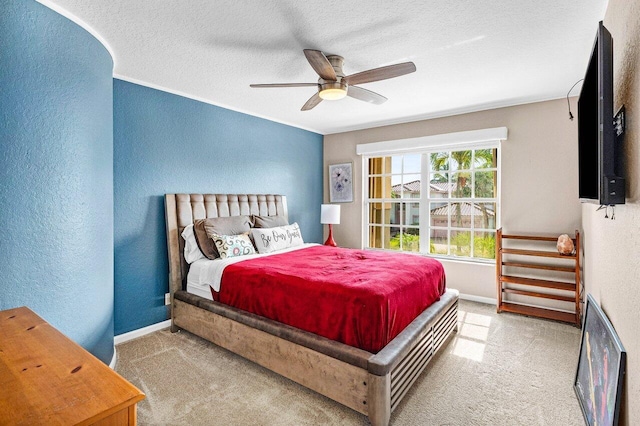 9391 Aqua Vista Blvd, Boynton Beach, FL 33437 - carpeted bedroom with a textured wall, a textured ceiling, baseboards, and ceiling fan