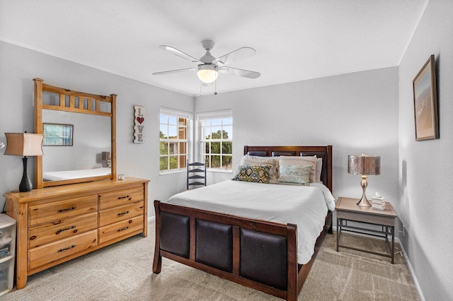 9391 Aqua Vista Blvd, Boynton Beach, FL 33437 - bedroom with light colored carpet, baseboards, and a ceiling fan