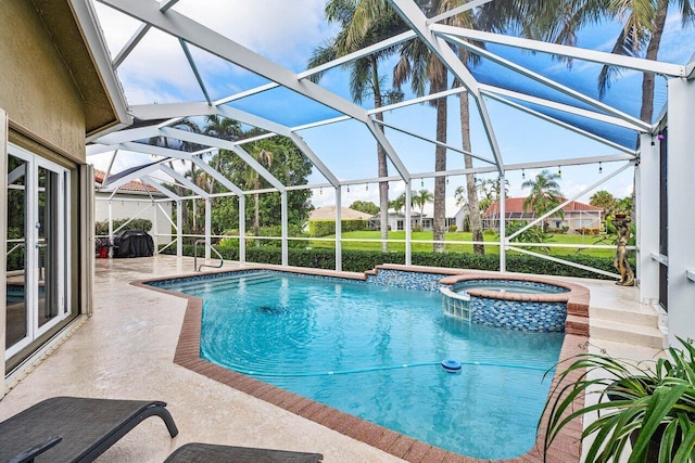 9391 Aqua Vista Blvd, Boynton Beach, FL 33437 - view of swimming pool with a patio area, a pool with connected hot tub, and a lanai