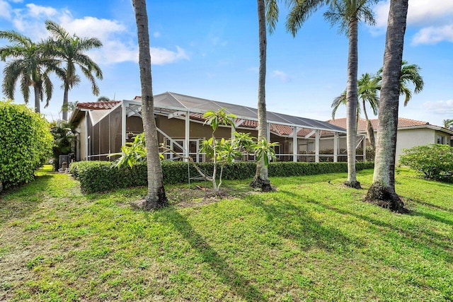9391 Aqua Vista Blvd, Boynton Beach, FL 33437 - view of grassy yard featuring a lanai