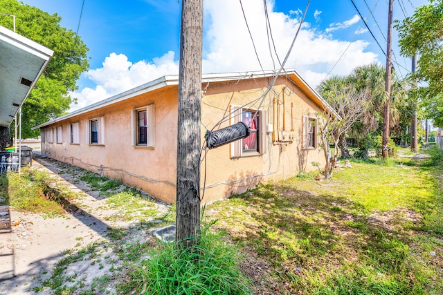 928 S H St Unit 1, Lake Worth, FL 33460 - view of side of home with stucco siding