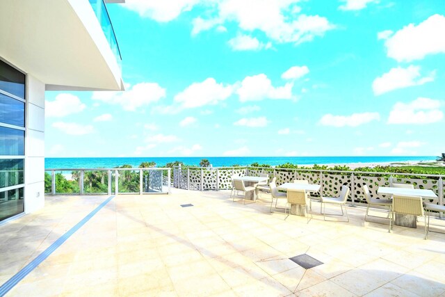 3100 N Ocean Dr Unit H-1608, Singer Island, FL 33404 - view of patio / terrace featuring outdoor dining space and a water view