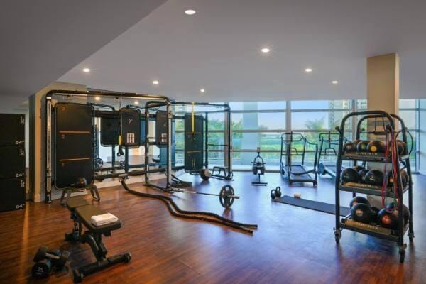 3100 N Ocean Dr Unit H-1608, Singer Island, FL 33404 - workout area with floor to ceiling windows, wood finished floors, and recessed lighting