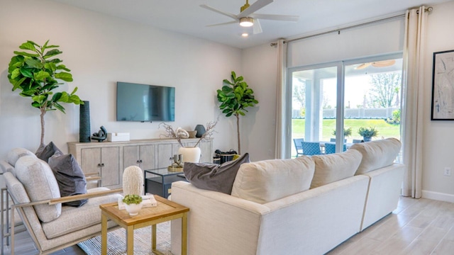 1297 SE Crosswood Way, Port Saint Lucie, FL 34984 - living area featuring ceiling fan, baseboards, light wood finished floors, and recessed lighting