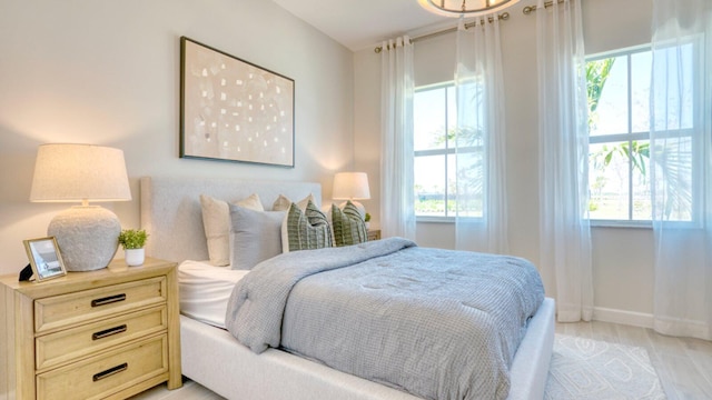 1297 SE Crosswood Way, Port Saint Lucie, FL 34984 - bedroom featuring baseboards