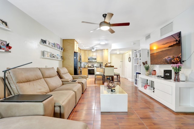 257 S Cypress Rd Unit 449, Pompano Beach, FL 33060 - living room with a ceiling fan