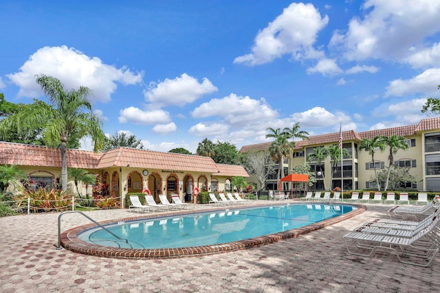 257 S Cypress Rd Unit 449, Pompano Beach, FL 33060 - community pool featuring a patio area