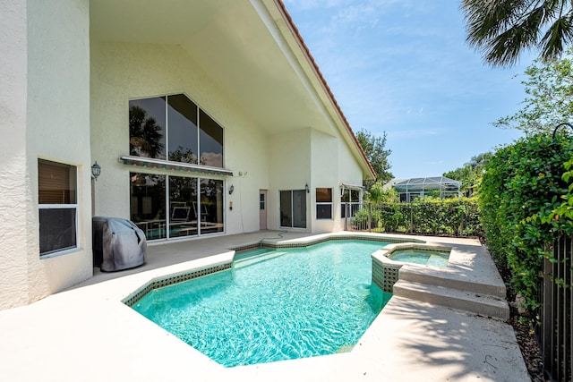 1414 SW Osprey Cv, Port Saint Lucie, FL 34986 - view of pool with a patio area and a pool with connected hot tub