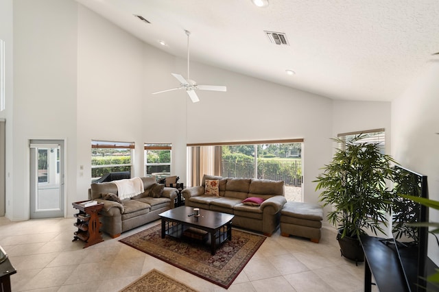 1414 SW Osprey Cv, Port Saint Lucie, FL 34986 - living area featuring light tile patterned flooring, high vaulted ceiling, ceiling fan, and recessed lighting
