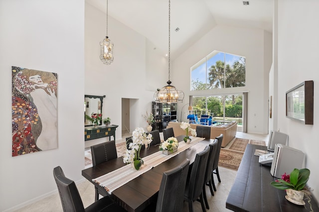 1414 SW Osprey Cv, Port Saint Lucie, FL 34986 - dining room with a chandelier and high vaulted ceiling