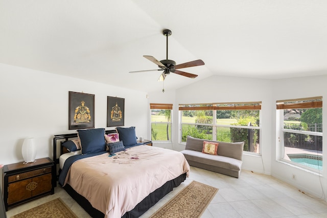 1414 SW Osprey Cv, Port Saint Lucie, FL 34986 - bedroom with multiple windows, lofted ceiling, light tile patterned flooring, a ceiling fan, and baseboards