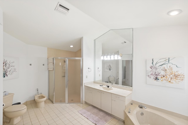1414 SW Osprey Cv, Port Saint Lucie, FL 34986 - bathroom featuring a bidet, a stall shower, tile patterned flooring, vanity, and toilet
