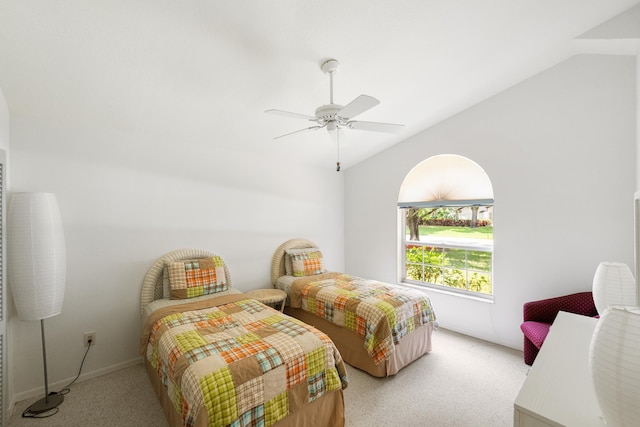 1414 SW Osprey Cv, Port Saint Lucie, FL 34986 - bedroom with light colored carpet, lofted ceiling, a ceiling fan, and baseboards