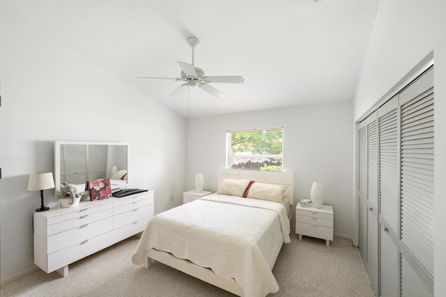 1414 SW Osprey Cv, Port Saint Lucie, FL 34986 - bedroom featuring vaulted ceiling, light carpet, a closet, and a ceiling fan