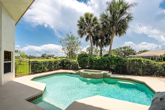 1414 SW Osprey Cv, Port Saint Lucie, FL 34986 - view of swimming pool with a pool with connected hot tub