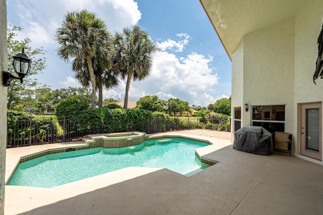 1414 SW Osprey Cv, Port Saint Lucie, FL 34986 - view of pool with grilling area, a patio, and a pool with connected hot tub