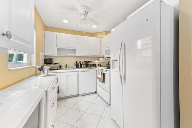 160 Tuscany C, Delray Beach, FL 33446 - kitchen featuring white appliances, ceiling fan, tile countertops, recessed lighting, and white cabinetry