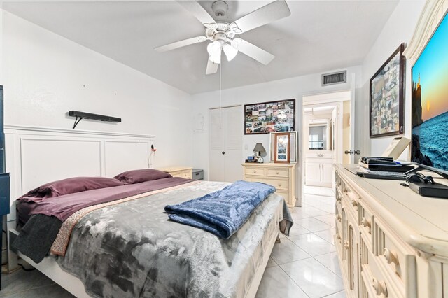 160 Tuscany C, Delray Beach, FL 33446 - bedroom featuring a ceiling fan and ensuite bath