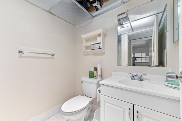 160 Tuscany C, Delray Beach, FL 33446 - bathroom with toilet, vanity, tile patterned floors, and baseboards