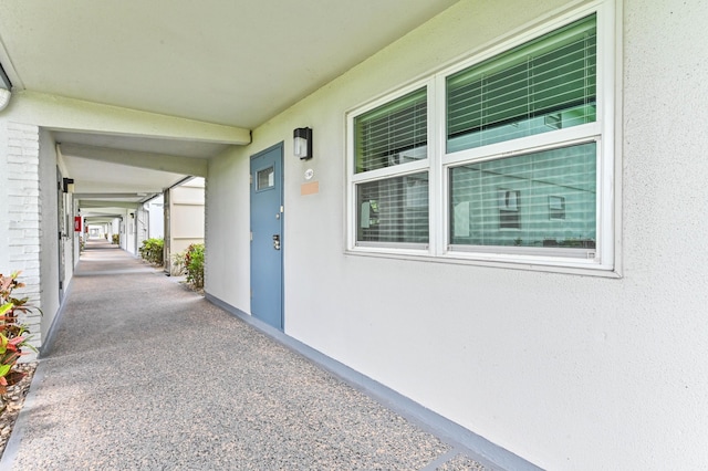160 Tuscany C, Delray Beach, FL 33446 - view of exterior entry with stucco siding