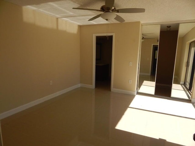 3721 37th Way, West Palm Beach, FL 33407 - spare room with ceiling fan, light tile patterned floors, and baseboards