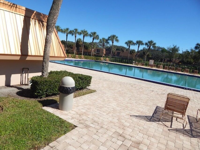 3721 37th Way, West Palm Beach, FL 33407 - community pool with a patio