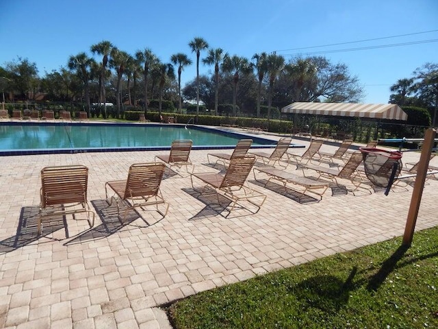 3721 37th Way, West Palm Beach, FL 33407 - community pool with a patio area