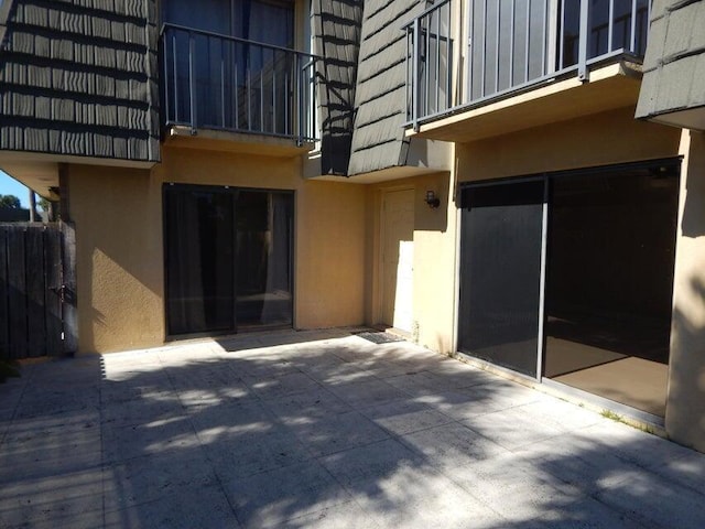 3721 37th Way, West Palm Beach, FL 33407 - view of patio featuring a garage