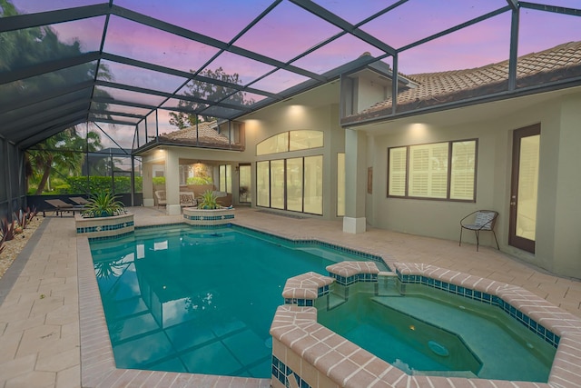 8060 Kiawah Trce, Port Saint Lucie, FL 34986 - view of pool with a pool with connected hot tub and a patio