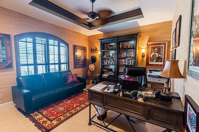 8060 Kiawah Trce, Port Saint Lucie, FL 34986 - home office with a ceiling fan, a tray ceiling, and tile patterned flooring