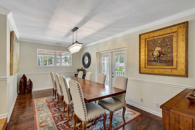 16095 121st Ter N, Jupiter, FL 33478 - dining area with crown molding, dark wood-style floors, a textured ceiling, french doors, and baseboards