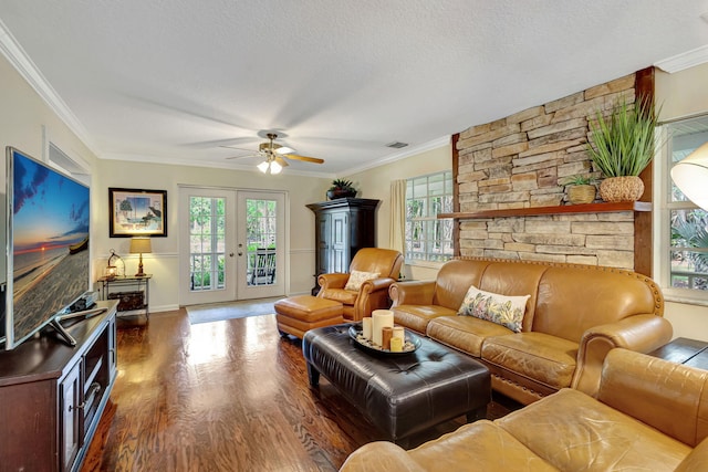16095 121st Ter N, Jupiter, FL 33478 - living area featuring ceiling fan, dark wood finished floors, healthy amount of natural light, crown molding, and a textured ceiling