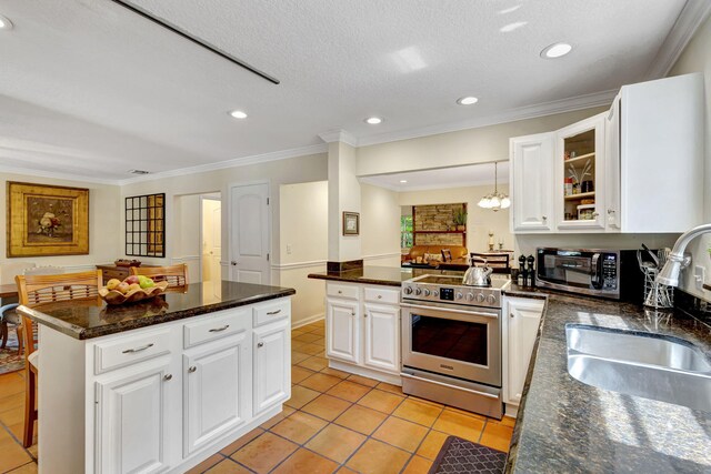 16095 121st Ter N, Jupiter, FL 33478 - kitchen featuring stainless steel electric range oven, a sink, light tile patterned floors, a peninsula, and ornamental molding