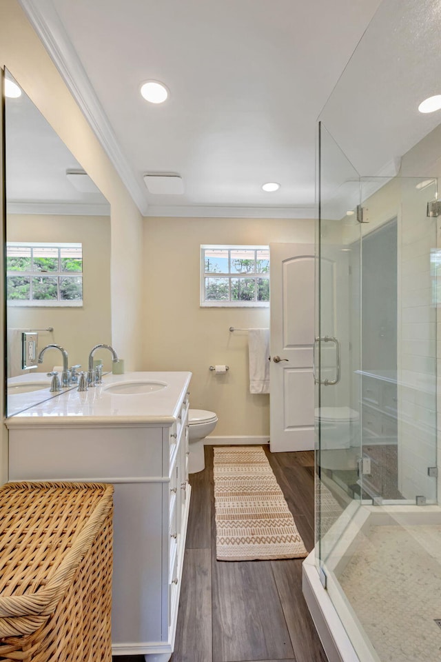 16095 121st Ter N, Jupiter, FL 33478 - full bath with crown molding, vanity, healthy amount of natural light, wood finished floors, and toilet