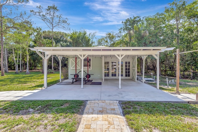 16095 121st Ter N, Jupiter, FL 33478 - view of patio featuring french doors