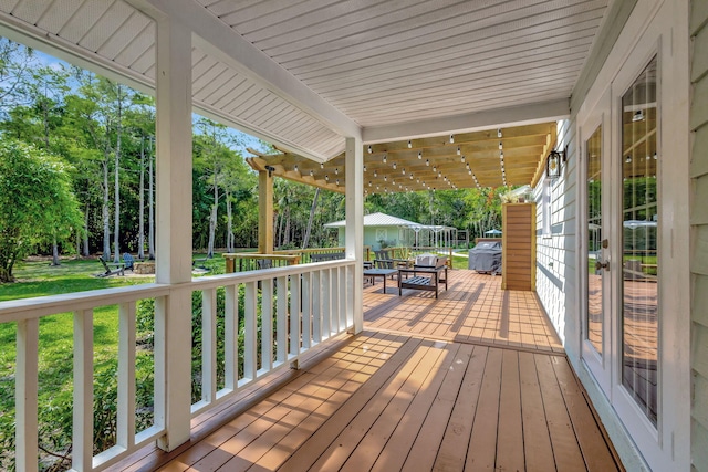 16095 121st Ter N, Jupiter, FL 33478 - deck featuring view of scattered trees and a yard