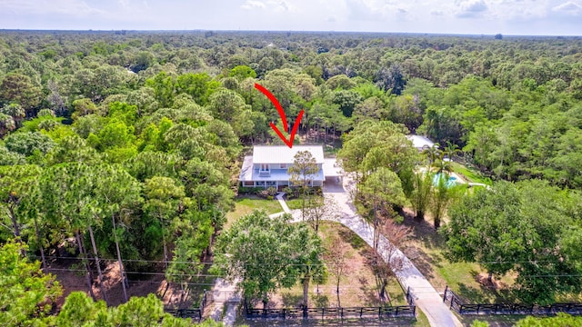 16095 121st Ter N, Jupiter, FL 33478 - view of subject property with a forest