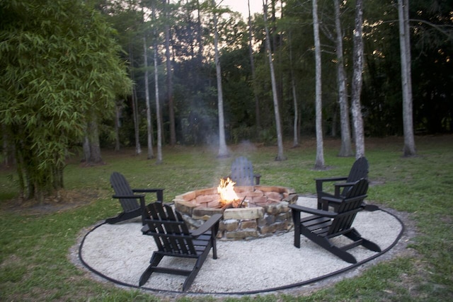 16095 121st Ter N, Jupiter, FL 33478 - view of patio / terrace featuring an outdoor fire pit