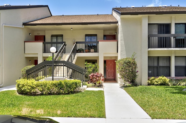5153 Oak Hill Ln Unit 512, Delray Beach, FL 33484 - view of property with stairway