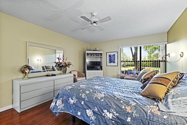 5153 Oak Hill Ln Unit 512, Delray Beach, FL 33484 - bedroom with wood finished floors, a textured ceiling, a ceiling fan, and access to exterior