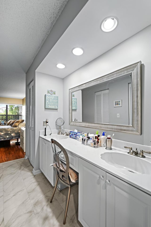 5153 Oak Hill Ln Unit 512, Delray Beach, FL 33484 - ensuite bathroom with marble look tiles and double vanity
