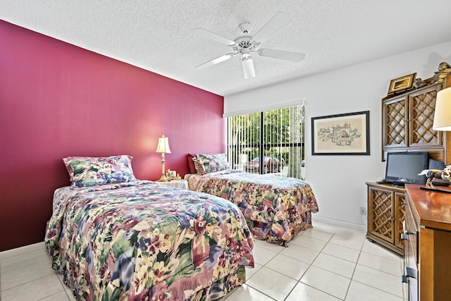 5153 Oak Hill Ln Unit 512, Delray Beach, FL 33484 - bedroom with access to outside, light tile patterned flooring, a textured ceiling, and a ceiling fan