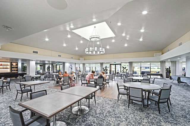 5153 Oak Hill Ln Unit 512, Delray Beach, FL 33484 - dining area featuring high vaulted ceiling, wood finished floors, and recessed lighting