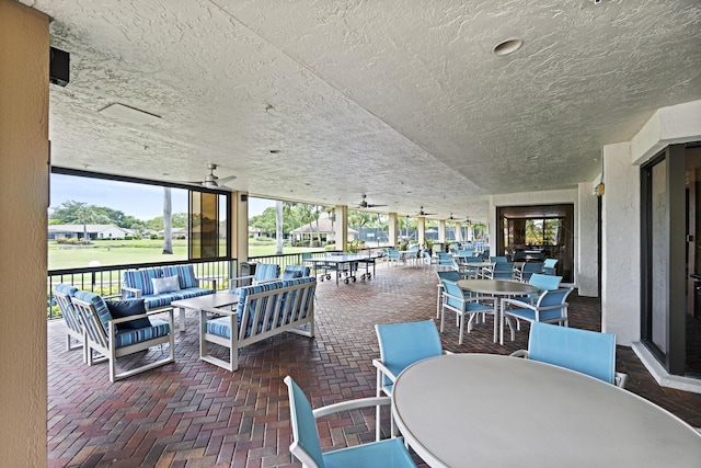 5153 Oak Hill Ln Unit 512, Delray Beach, FL 33484 - view of patio with outdoor dining area and an outdoor living space
