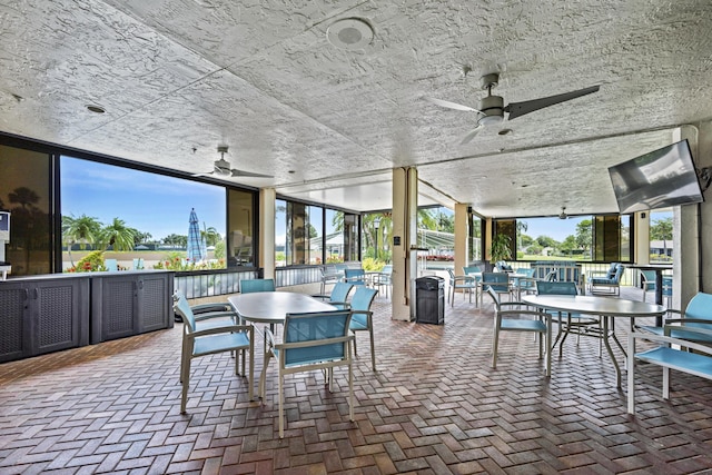 5153 Oak Hill Ln Unit 512, Delray Beach, FL 33484 - view of patio with ceiling fan and outdoor dining area