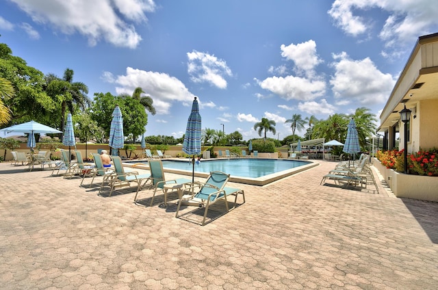 5153 Oak Hill Ln Unit 512, Delray Beach, FL 33484 - community pool featuring a patio