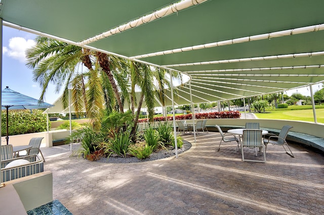 5153 Oak Hill Ln Unit 512, Delray Beach, FL 33484 - view of patio / terrace featuring outdoor dining area