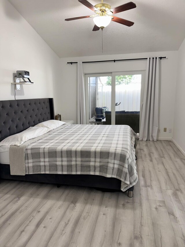 1518 Royal Forest Ct, Palm Springs, FL 33406 - bedroom with lofted ceiling, access to exterior, wood finished floors, ceiling fan, and baseboards